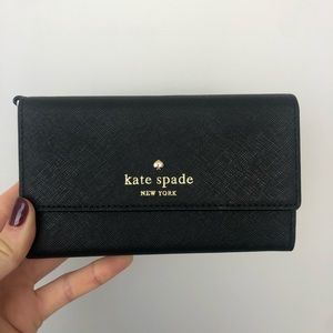 kate spade black wallet in perfect condition.
